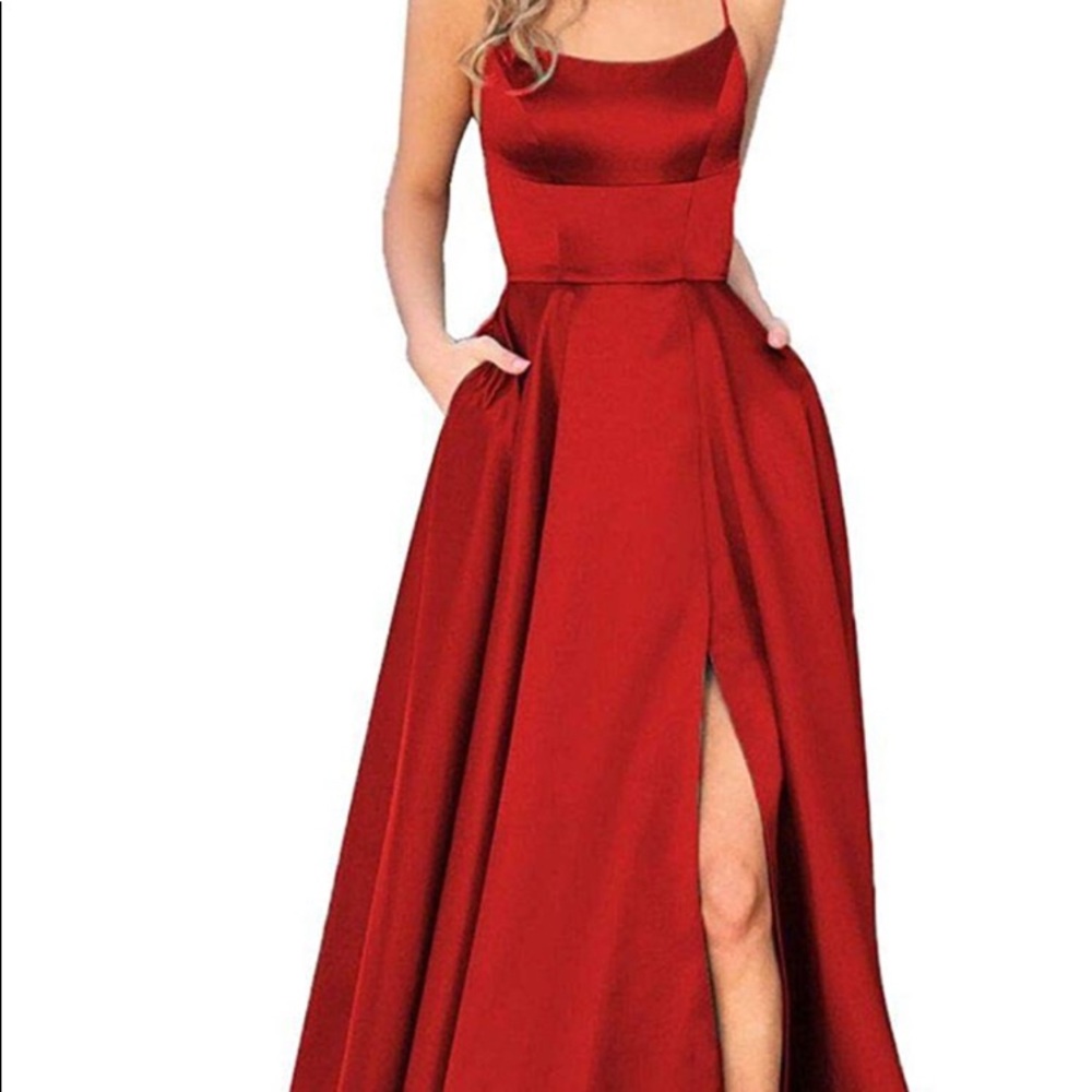 Red dress with split on the side, has pockets and only used once.